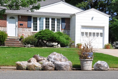 Professionals clearing an organized garage